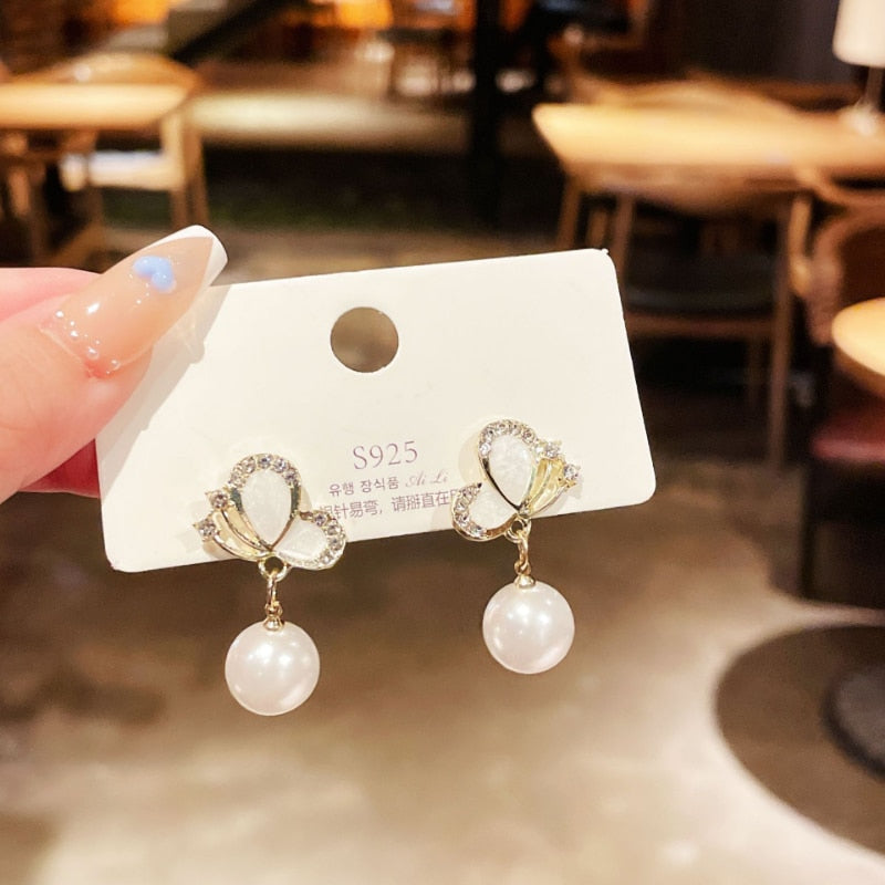 European and American Fashion New Zircon Butterfly Oil Dropping Earrings for Women Simple Personality Pearl Party Earrings