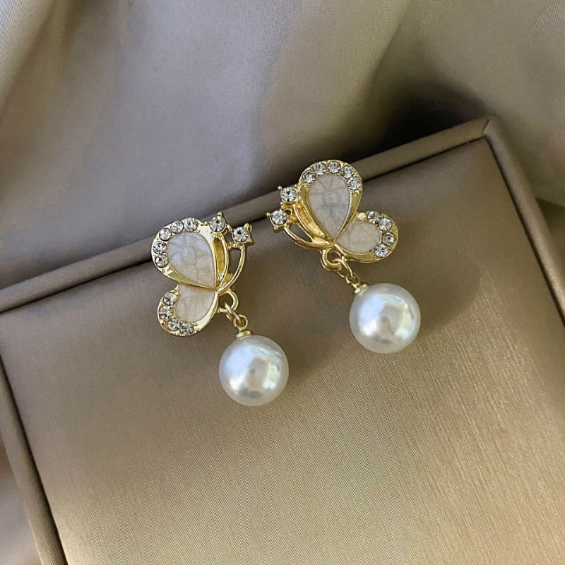 European and American Fashion New Zircon Butterfly Oil Dropping Earrings for Women Simple Personality Pearl Party Earrings