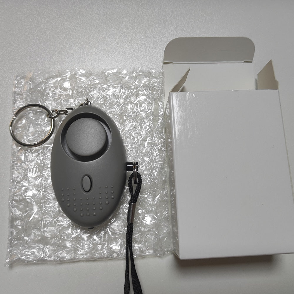 Portable Self Defense 130dB Anti Aggression Personal Security Alarm Keychain LED Lights Emergency Safety For Women