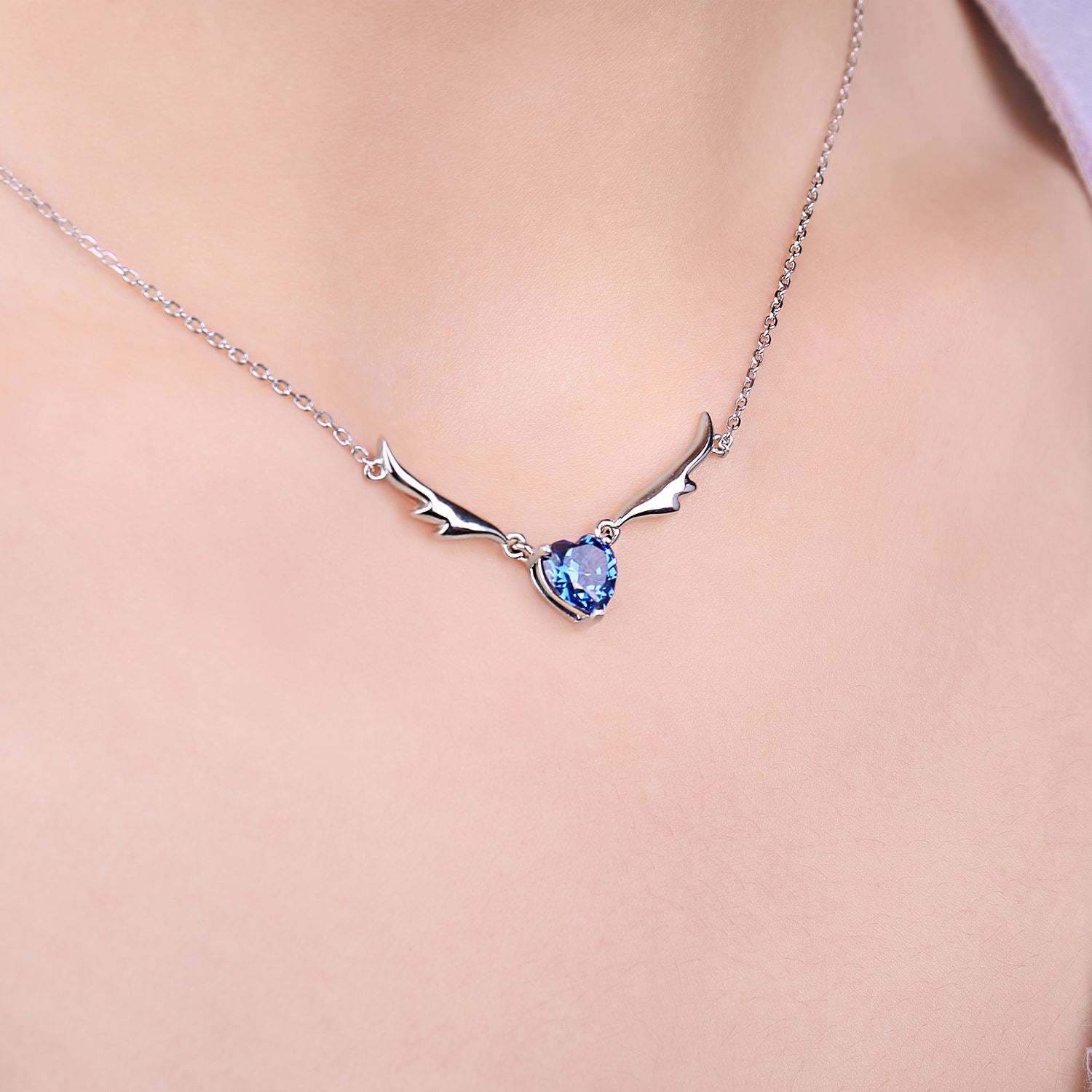 JewelryPalace New Arrival Angel Wing 1.5ct Love Heart Blue Gemstone 925 Sterling Silver Pendant Necklace for Woman Fashion 45cm - Charlie Dolly