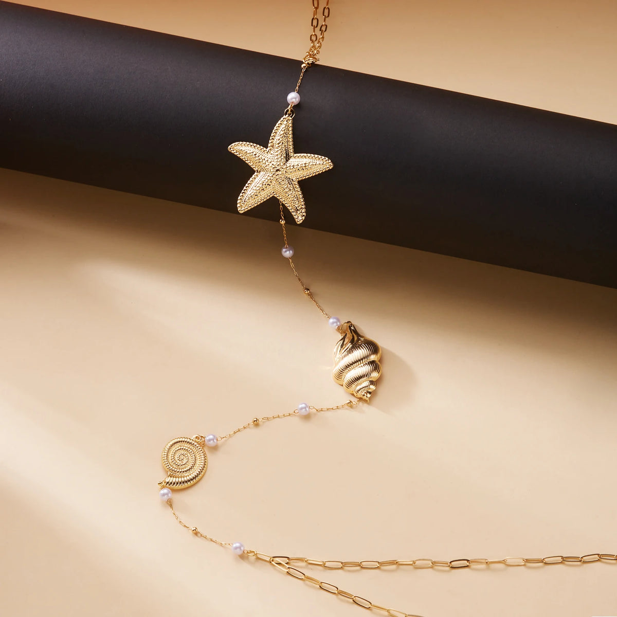 Gold Starfish, Shell and Pearl Backdrop Body Chain