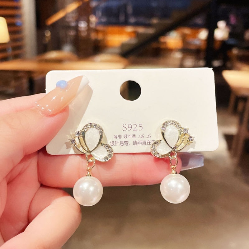 European and American Fashion New Zircon Butterfly Oil Dropping Earrings for Women Simple Personality Pearl Party Earrings