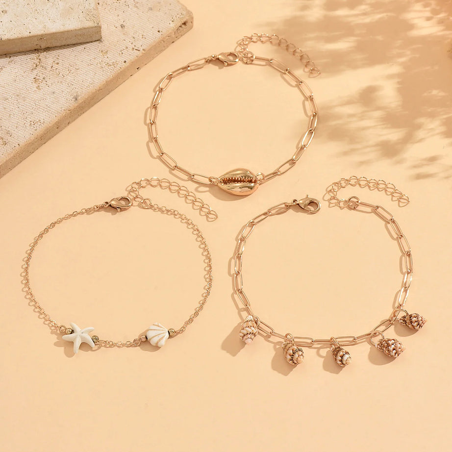 Cowrie, Conch and Starfish Stackable Gold Anklet Set (3 Pieces)