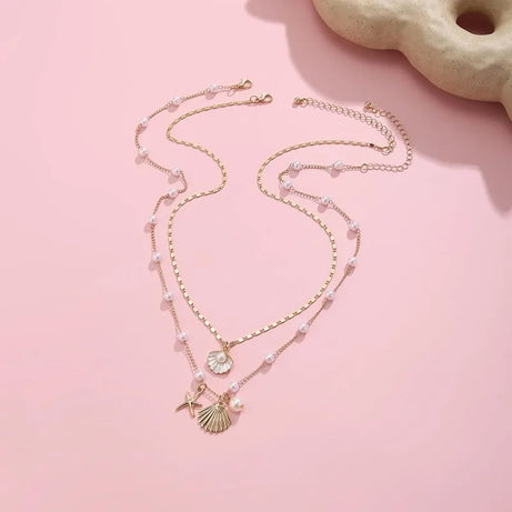 Gold Seashell and Starfish Layered Pendant Necklace