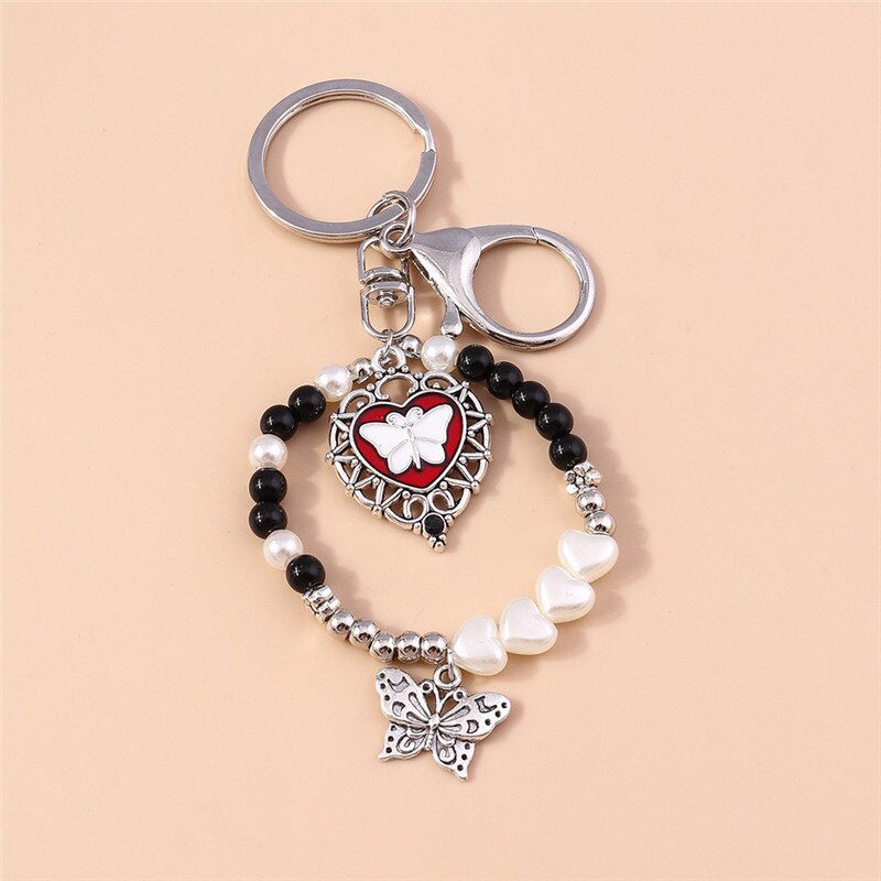 1Pc Bohemia Evil Eye Hamsa Hand Keychain for Women Men Blue Eye Sun Feather Key Ring Bag Pendant Car Key Holder Rings Wholesale - Charlie Dolly