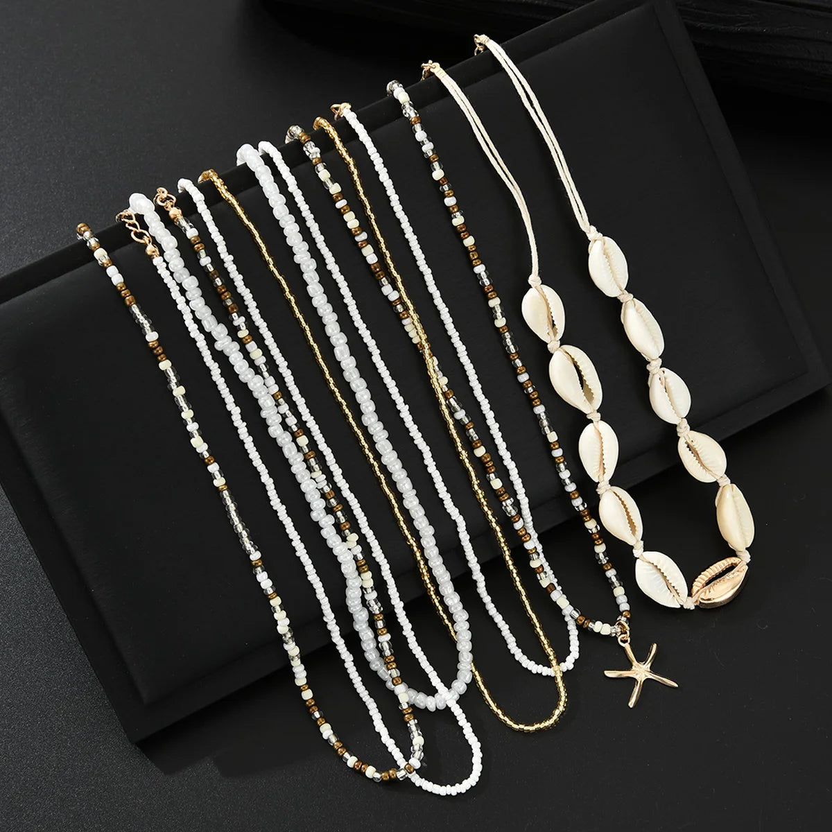 7Pcs/Set Boho Starfish Conch Rice Beads Pendant Necklace for Women Fashion White Color Multi layered Necklace Set Summer Jewelry