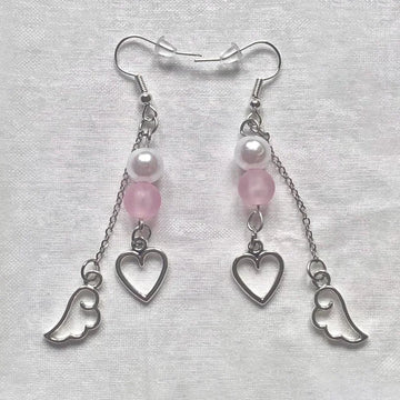 Pink beaded earrings, wing charms, boho jewelry