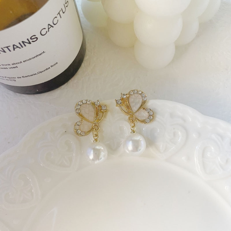 European and American Fashion New Zircon Butterfly Oil Dropping Earrings for Women Simple Personality Pearl Party Earrings - Charlie Dolly