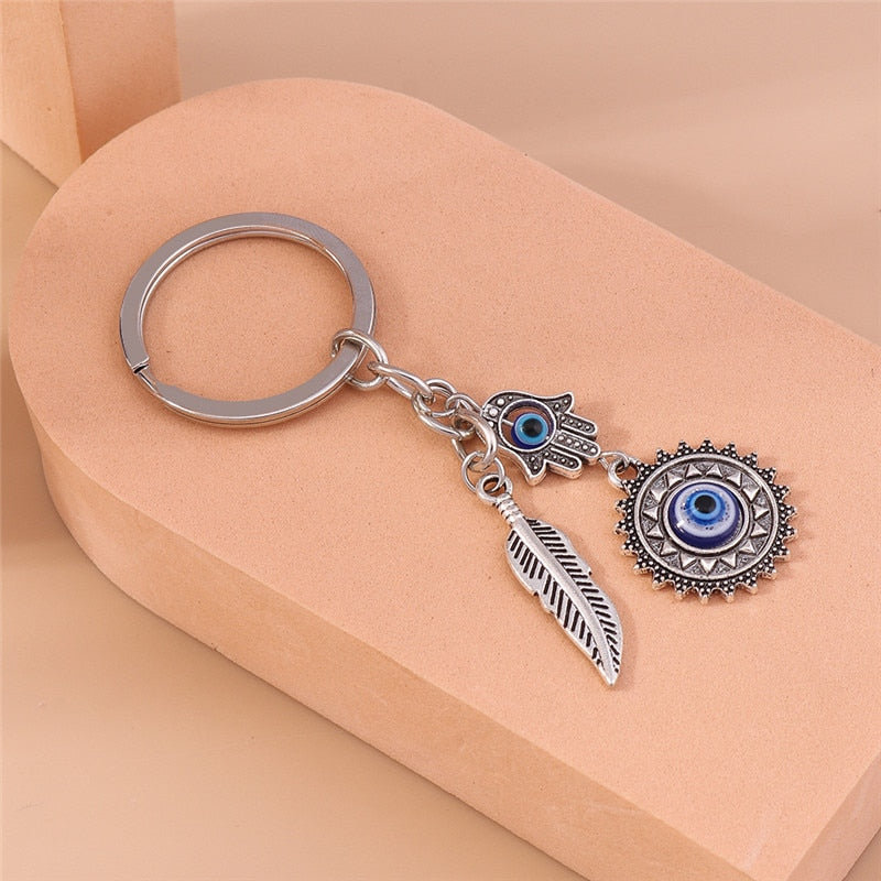 1Pc Bohemia Evil Eye Hamsa Hand Keychain for Women Men Blue Eye Sun Feather Key Ring Bag Pendant Car Key Holder Rings Wholesale - Charlie Dolly