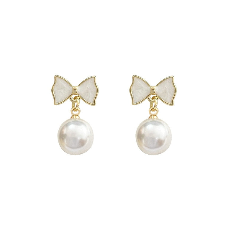 European and American Fashion Women's Simple Personality Exquisite Temperament Earrings Bow Knot Shell Pearl Earrings Jewelry - Charlie Dolly