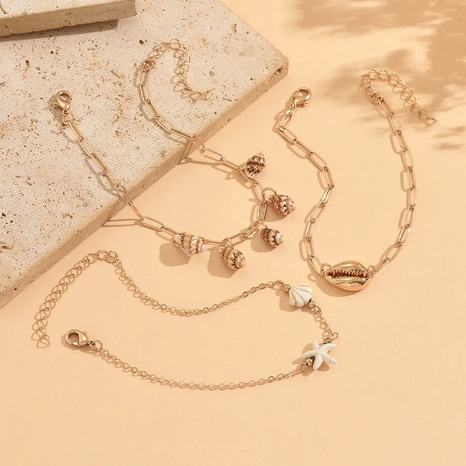 Cowrie, Conch and Starfish Stackable Gold Anklet Set (3 Pieces)