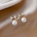 European and American Fashion Women's Simple Personality Exquisite Temperament Earrings Bow Knot Shell Pearl Earrings Jewelry - Charlie Dolly