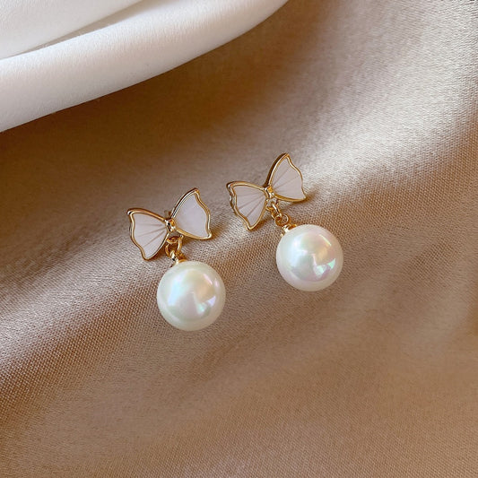 European and American Fashion Women&#39;s Simple Personality Exquisite Temperament Earrings Bow Knot Shell Pearl Earrings Jewelry - Charlie Dolly